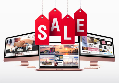 Продажа сайтов — 3 ноутбука и надпись Sale